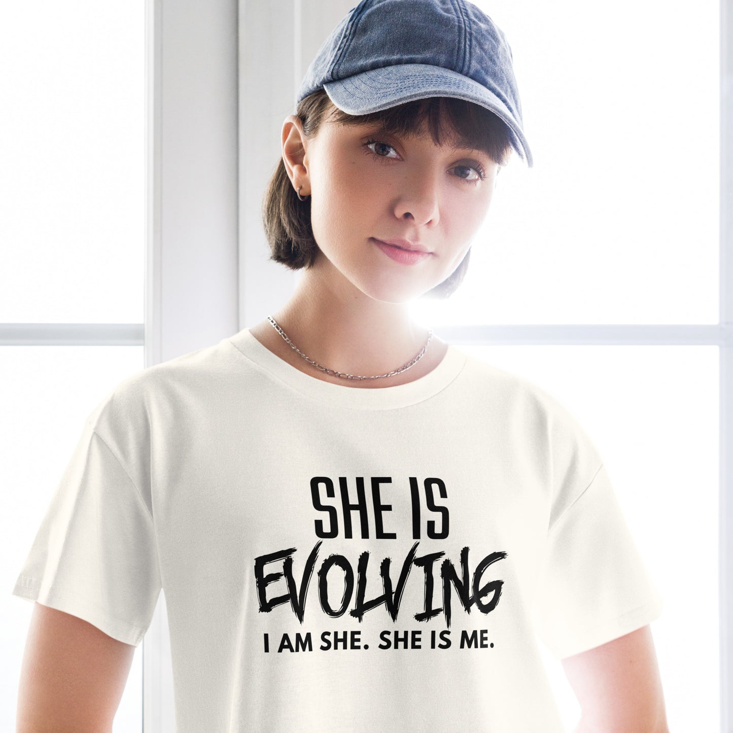 She Is Evolving Women’s crop top