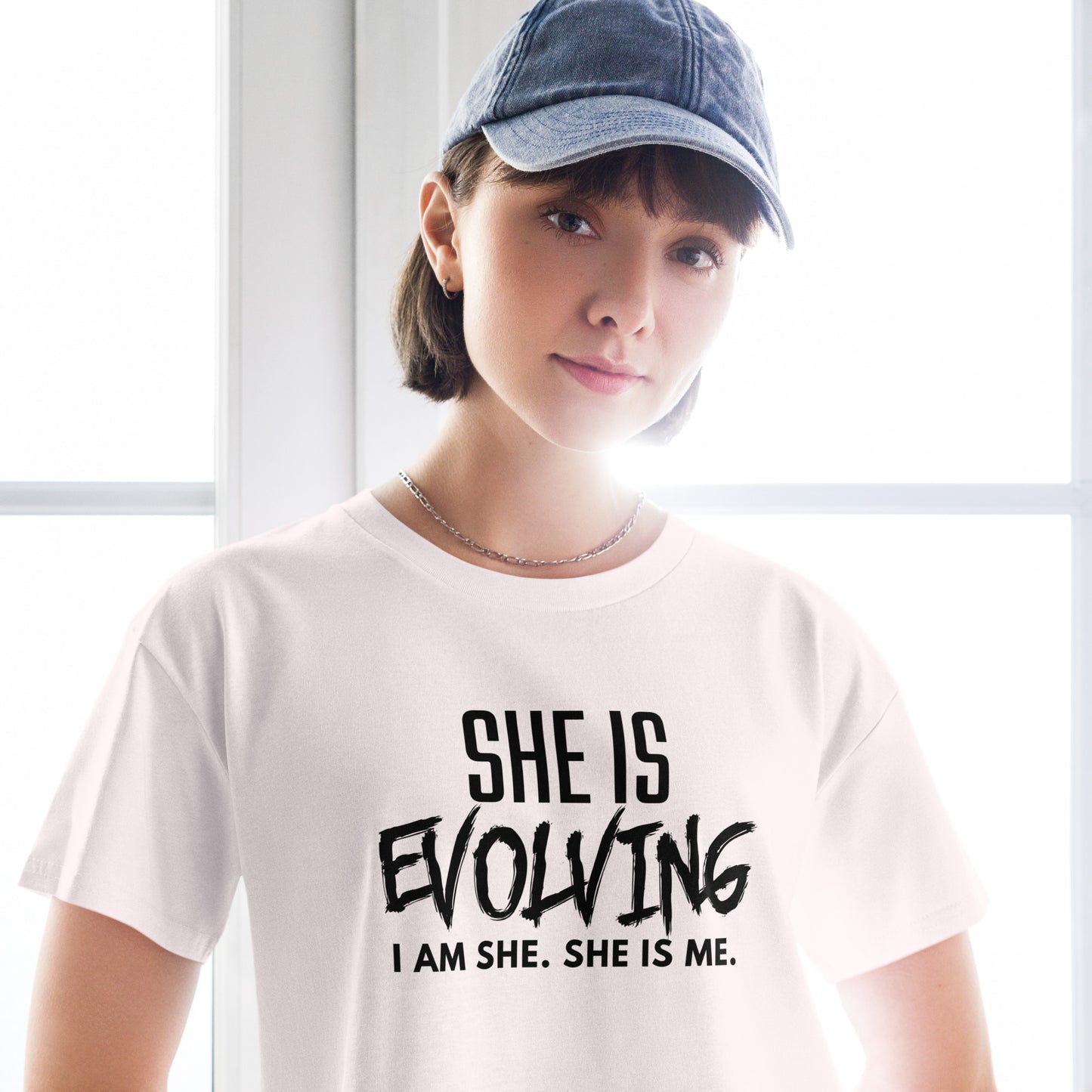 She Is Evolving Women’s crop top